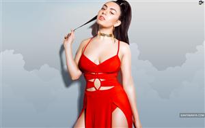 Charli XCX looks like a cherry in a hot red engaging dress